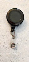 (1) Black Badge Reel