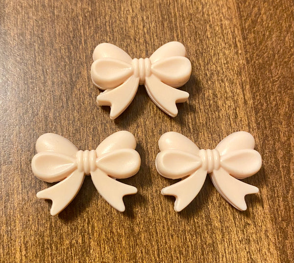 3) White Silicone Bow Beads – LBL Creations