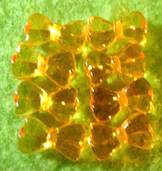 (8) Orange Clear Bow Beads