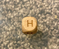 (1) Wooden "H" Bead