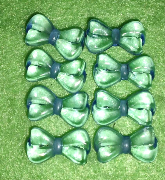 (8) Light Blue Clear Bow Beads