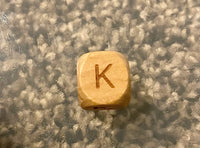 (1) Wooden "K" Bead