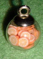(1) Orange Shaker Charm